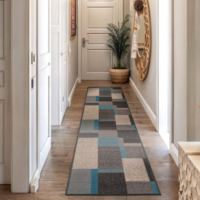 Tapis bleu tissé à la machine Bolk