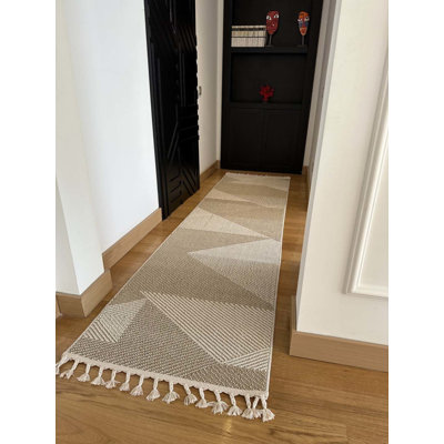 Tapis rectangulaire Tilina avec envers antidérapant