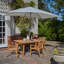 Sirmans 4 - Person Wood Patio Dining Set with Rectangular Table-530862758