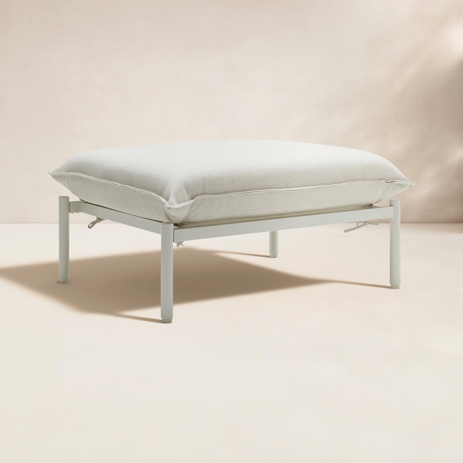 Metal Outdoor Ottoman with Sunbrella® Cushion, Putty