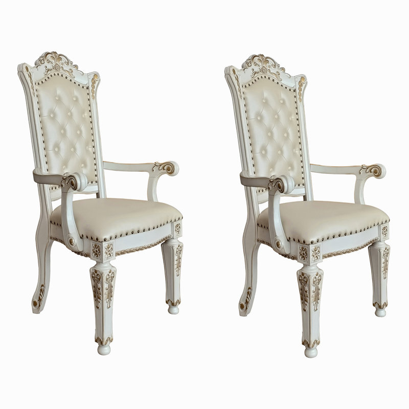 Ensemble de 2 fauteuils capitonnés à dossier