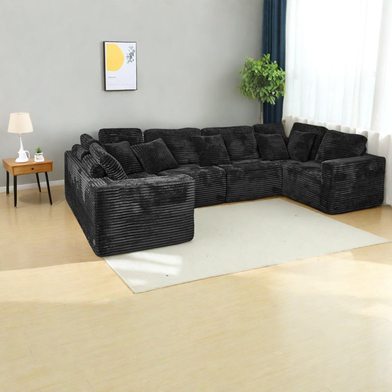 Canapé confortable modulaire en forme de U, velours côtelé noir, salon moderne et spacieux