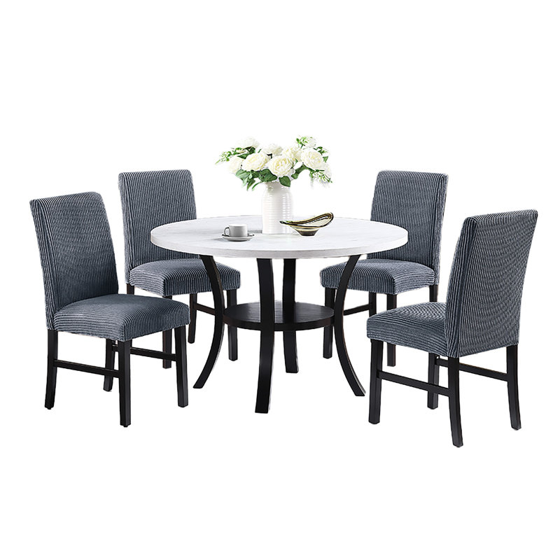 Table contemporaine 5 pièces: siège gris foncé avec table ronde blanche et tablette inférieure pour les dîners décontractés, quatre sièges en velours côtelé