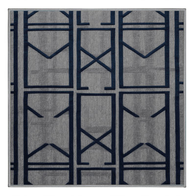 Tapis gris en treillis lavable à la machine
