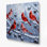 Christmas Cardinal birds on snow covered branches Blue Metal Wall Art