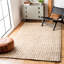 Tapis en jute tissé à la main résistant aux taches Tressie-594044427