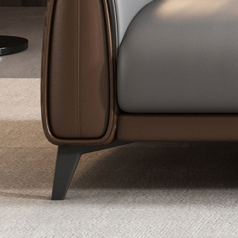 Canapé modulaire gris en similicuir