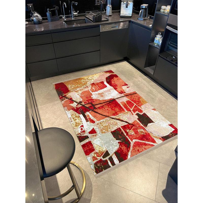 Tapis décoratif moderne à motifs abstraits dans les tons rouges de la collection Barcelona