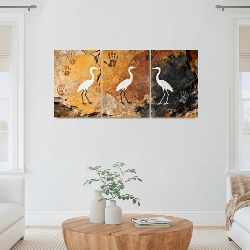 Ensemble de 3 tableaux sur toile tendue représentant un héron blanc et une empreinte de main dans une grotte