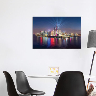 Pudong Skyline Lightshow, Shanghai, China by Jan Becke - Wrapped Canvas Print