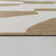 Emmie Abstract Machine Woven Polypropylene Indoor / Outdoor Use Area Rug in Tan/Cream