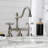 Kingston Brass Restoration Two-Handle 3-Hole Deck Mount Bridge Bathroom Faucet with Brass Pop-Up-64006002