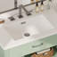 Meuble-lavabo de 79 cm avec lavabo rectangulaire en céramique, grand espace de rangement, rayures verticales et poignées argentées pour un design moderne et élégant. Profil incurvé, esthétique accueillante.