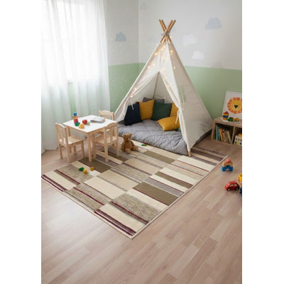 Tapis rayé multicolore en laine touffetée à la main