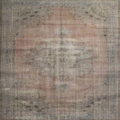 Tapis à motif oriental gris clair