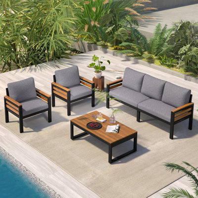 Ensemble de canapé d'extérieur 4 pièces pour 5 personnes avec accoudoirs en bois d'acacia, ensemble de conversation avec coussin amovible et table basse en bois massif pour le jardin et la cour
