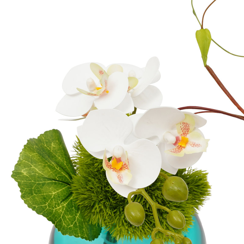 Arrangement de fleurs artificielles dans un vase, Bleu