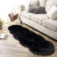 Tapis noir en fausse fourrure-77438960