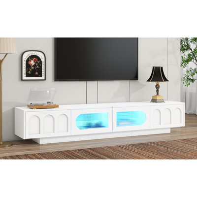 Meuble télé blanc jusqu'à 95 po, avec portes en verre trempé et lumières à DEL managées, console de divertissement fonctionnelle avec rangement central à cannelures blanches pour téléviseurs, tiroirs à lumières multimédia