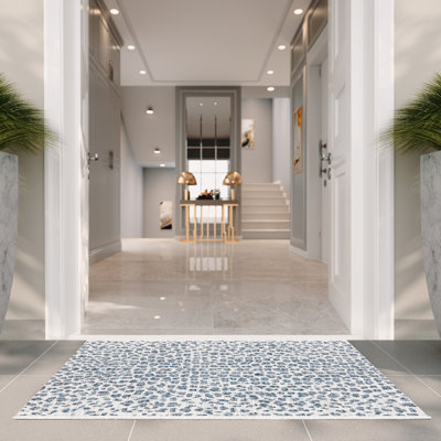 Tyron Animal Print Ivory/Navy Area Indoor/Outdoor Area Rug