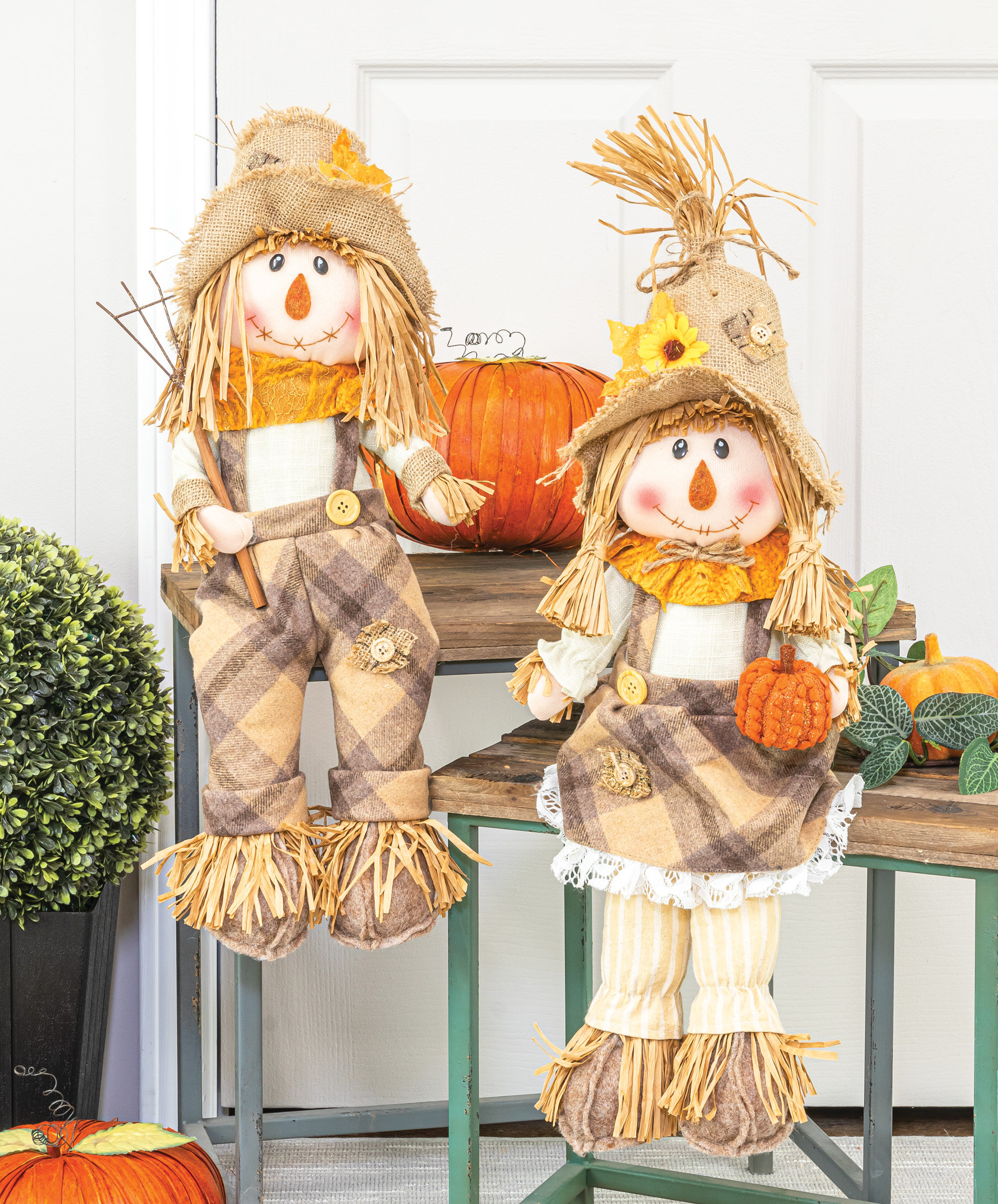 https://assets.wfcdn.com/im/82347551/compr-r85/2072/207261311/2-piece-timber-scarecrow-shelf-sitter-set.jpg