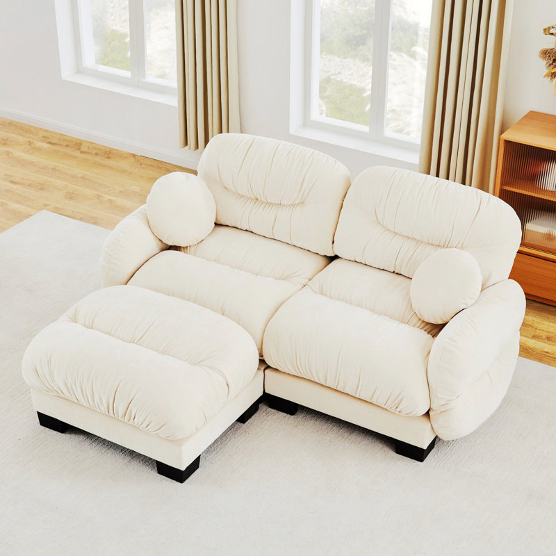Canapé modulaire 2 places avec accoudoirs courbés, repose-pieds et coussins décoratifs, Beige