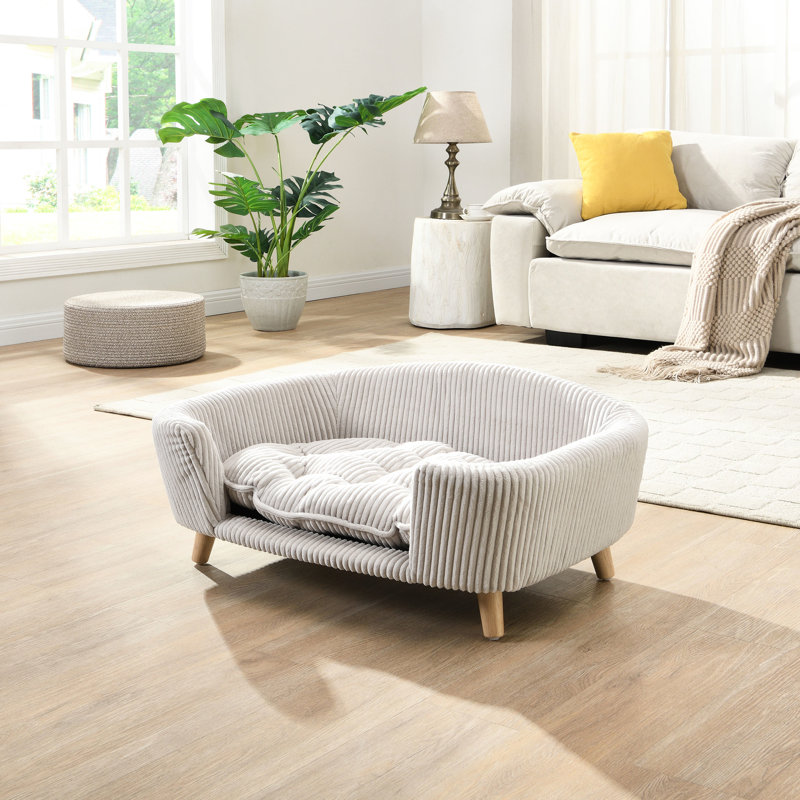 Petit cadre de lit pour chien avec matériau en velours côtelé, pieds en bois d'hévéa, mousse de soutien, teinte beige, assemblage sans effort pour une conception confortable et surélevée, installation facile pour animaux de compagnie