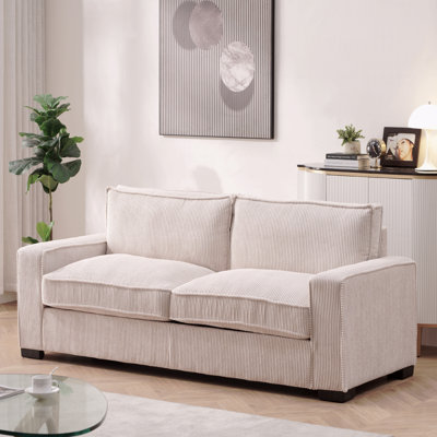 Canapé en velours côtelé au design épuré, spacieux et confortable pour un salon moderne, idéal pour le divertissement et les moments de détente