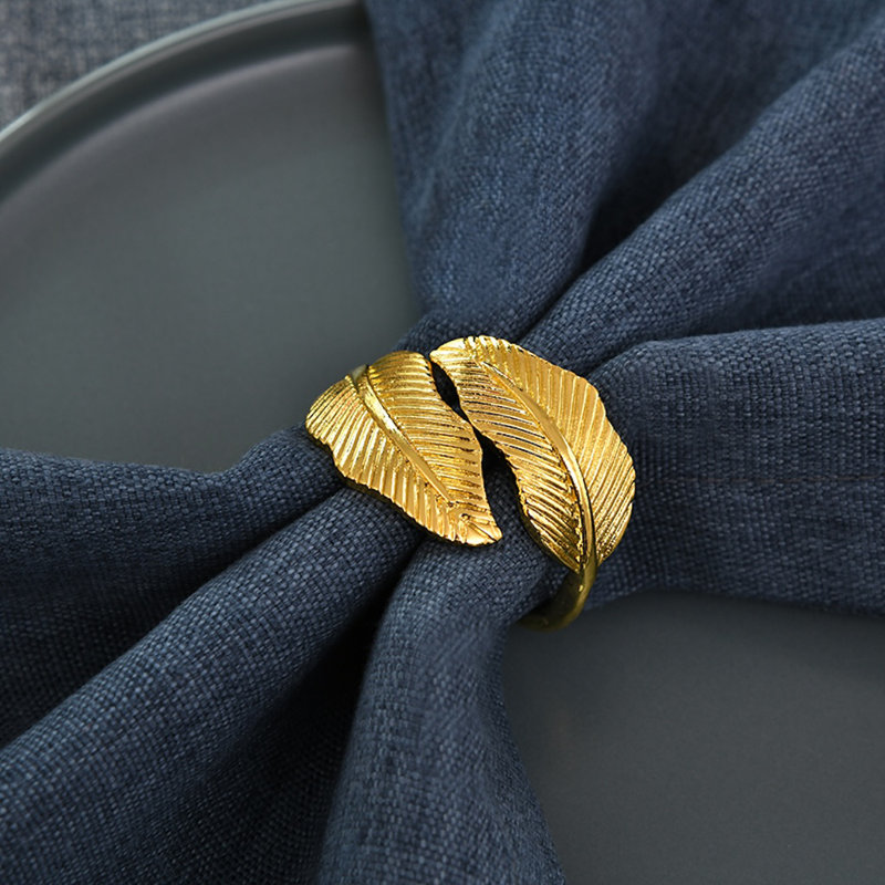 Gold Napkin Rings Set of 4 Stylized Overlapping Leaf Design for Elegant Dining Table Decor