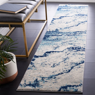 Tapis ivoire / bleu Haviland 276