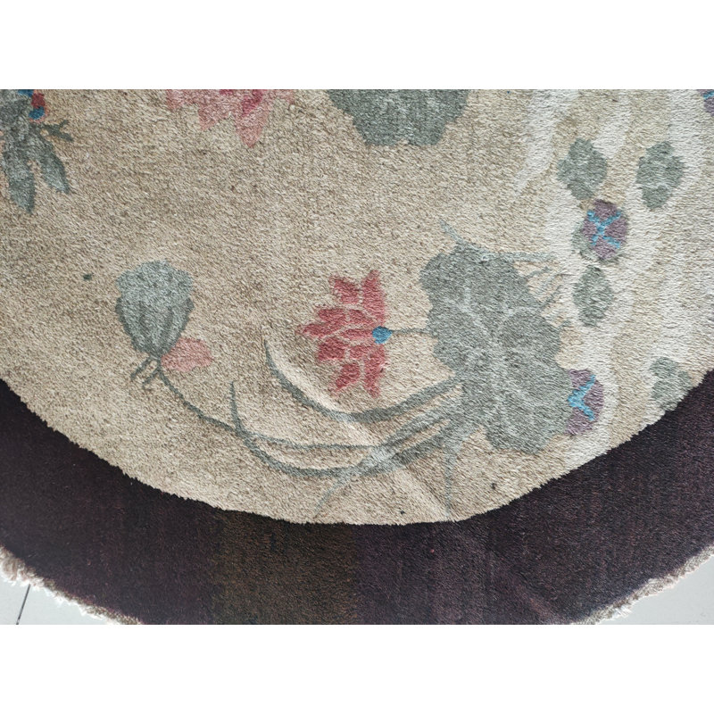 Tapis rond antique ivoire Art déco