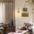 Dimmable Armed Wall Sconce with Clear Glass Shade