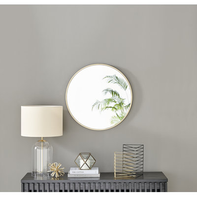 Alcantera Round Metal Frame Wall Mirror Simple and Elegant Modern Design