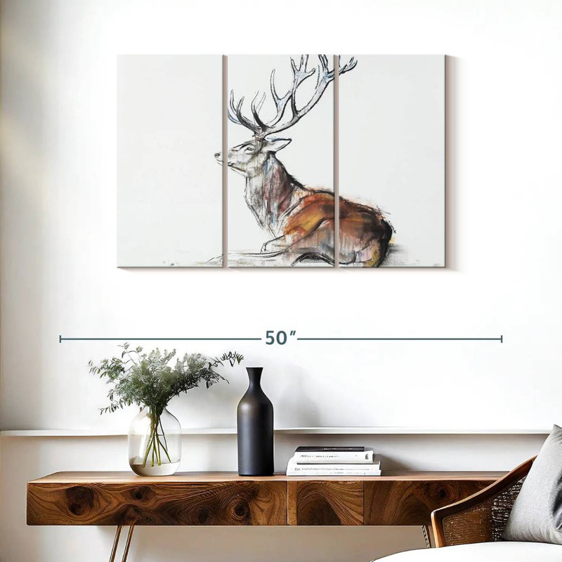 Cerf assis, H 24 po x l 38 po