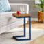 Petite table d'appoint compacte et élégante, parfaite pour un décor moderne et rustique, avec une surface facile à nettoyer et un design peu encombrant.