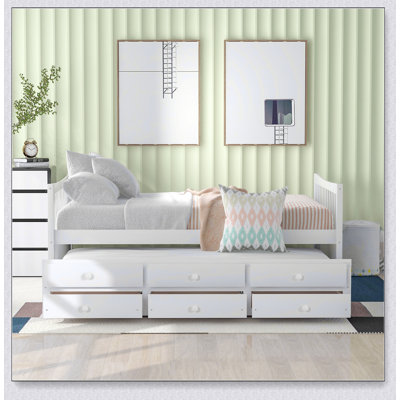 Lit de jour élégant avec lit gigogne et tiroirs, parfait pour un espace de couchage supplémentaire et un rangement dans les maisons modernes.