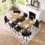 Salle à manger ovale moderne, plateau de table en grain de bois bicolore et chaises en similicuir noir-2065675569-2065675580-2065675570