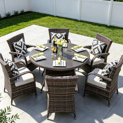 Indiya 6 - Person Premium All-Weather Wicker Patio Dining Set with Round Table , Cushions Included