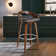 Maxime Swivel Counter or Bar Height Bar Stool with Open Low Back in Faux Leather and Wood
