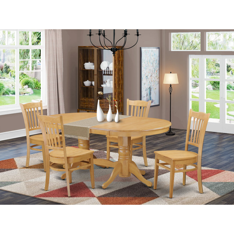 L'ensemble 5 pièces de table et chaises de cuisine comprend une table de salle à manger ovale avec rallonge papillon et 4 chaises en bois massif, chêne