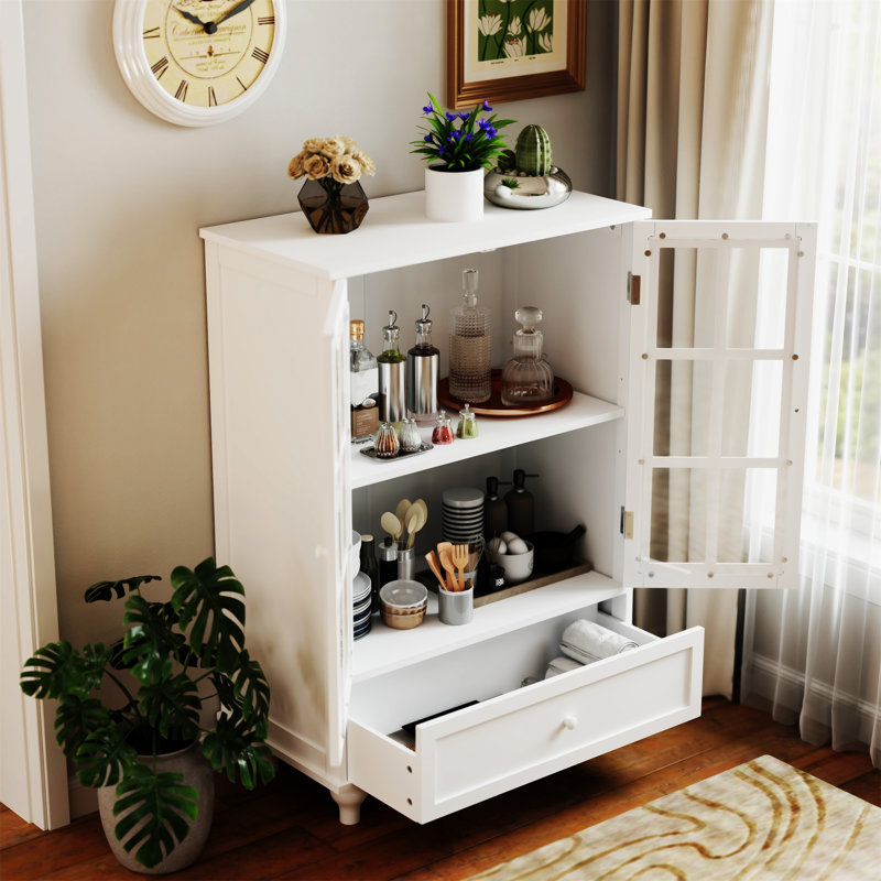 Buffet minimaliste blanc avec portes doubles en verre et tiroir