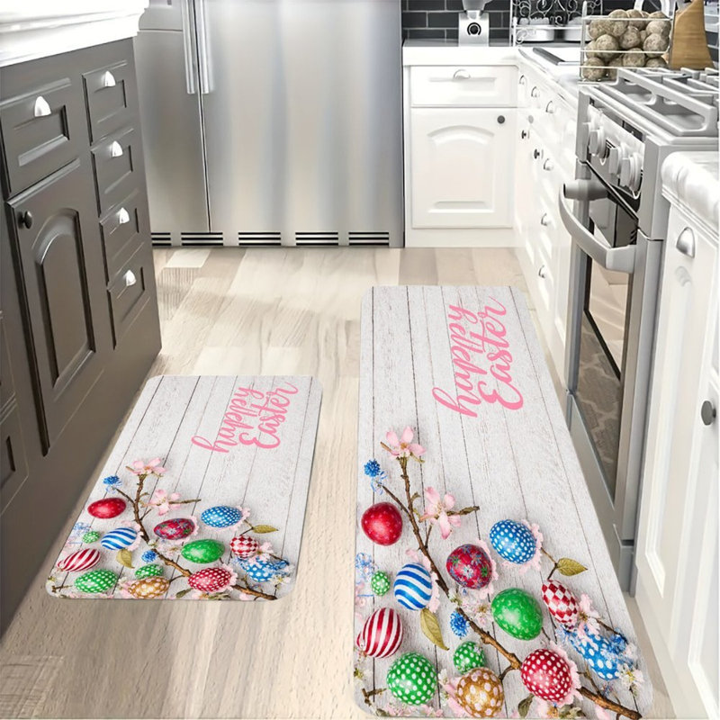 Ensemble de 2 œufs de Pâques colorés et tapis de cuisine colorés