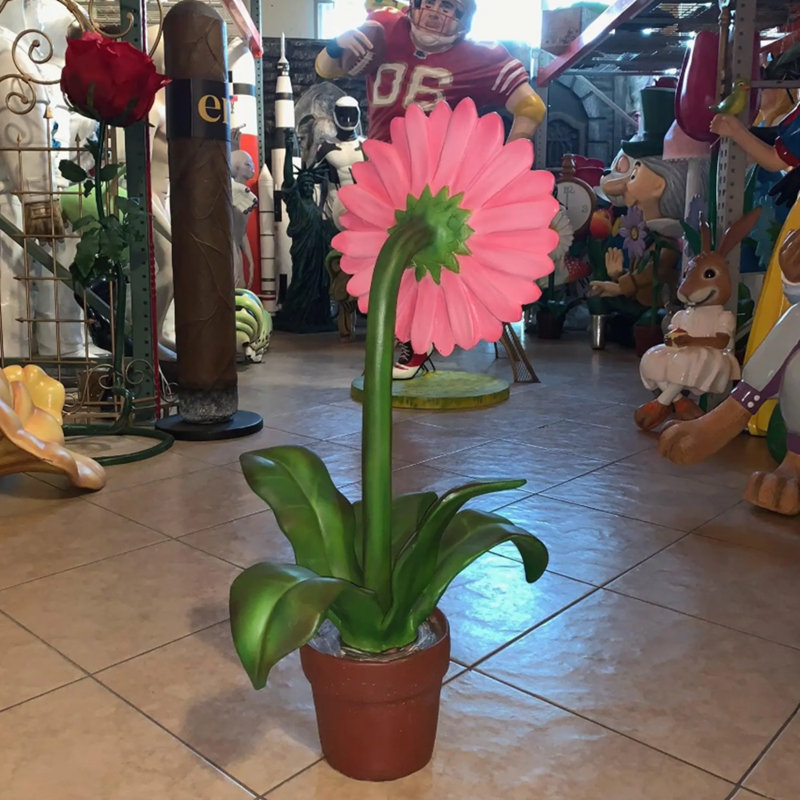 Petite statue de marguerite rose en pot