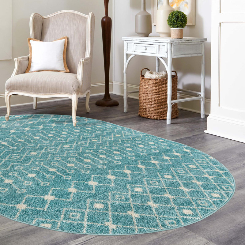 Tapis bleu turquoise en polypropylène tissé à la machine Briehn, Ovale 4 pi x 6 pi
