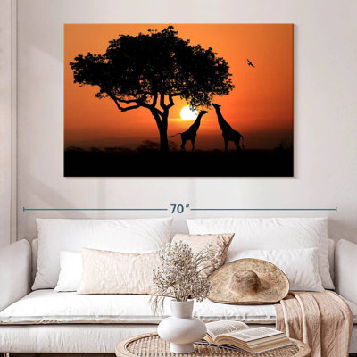 Couple de girafes Brampt au coucher du soleil