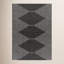 Tapis intérieur / extérieur noir à motif géométrique Abdulazeez Irielle-112820621