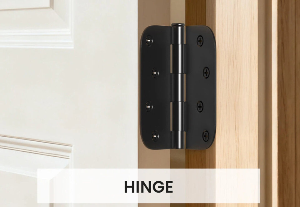 Matte black door hinge installed on a wooden door frame.