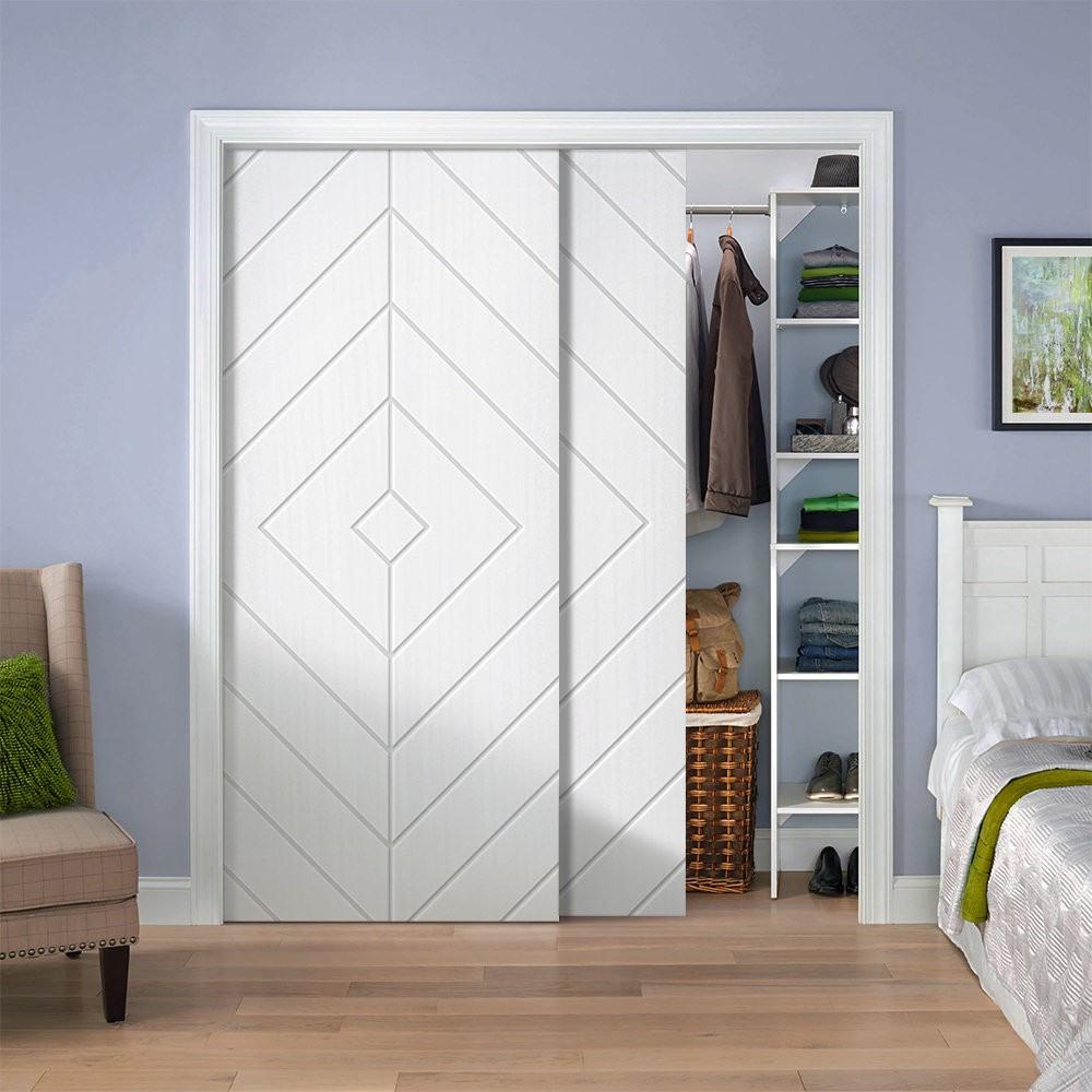 Calhome Hollow Paneled Painted Sliding Closet Doors | Wayfair