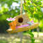 Décoration de jardin avec chapeau de paille