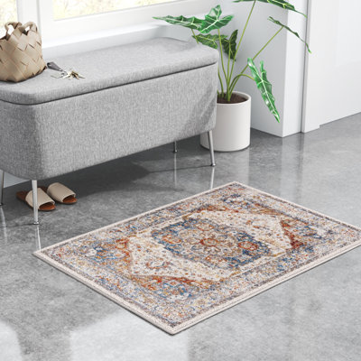 Tapis floral en polypropylène tissé à la machine gris clair / orange / bleu Kiaan